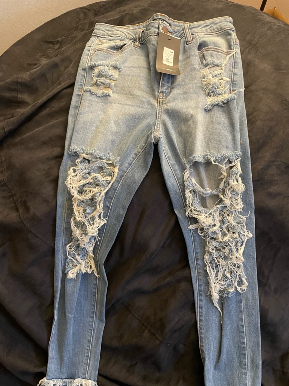 Fashion Nova Light Wash Distressed Skinny Jeans